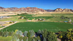 Exterior space with a water and mountain view and a rural view