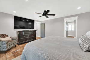 Bedroom featuring light wood-type flooring and ceiling fan