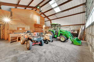 Garage featuring a workshop area