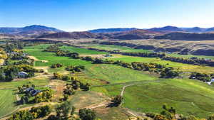 Aerial view featuring a mountain view and a rural view