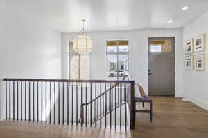 Hallway featuring hardwood / wood-style flooring