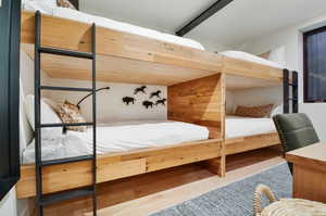 Bedroom featuring wood-type flooring