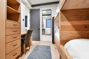 Bedroom with light wood-type flooring