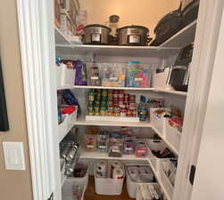 Large kitchen pantry has room to keep everything organized!