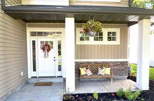 East facing covered front porch perfect for taking in the mountain views and relaxing in the evenings