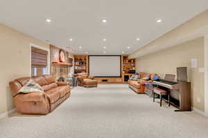 Family room with light colored carpet