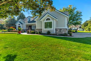 View of front of home with a front lawn