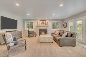 Living room featuring light colored carpet