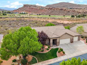 Birds eye view of property with a mountain view