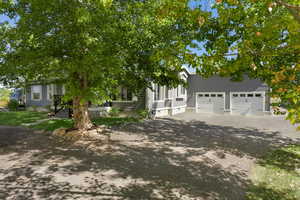 View of front of property with a garage