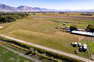 Drone / aerial view with a mountain view and a rural view