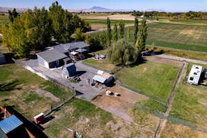 Drone / aerial view featuring a mountain view and a rural view