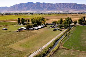 Drone / aerial view featuring a rural view and a mountain view