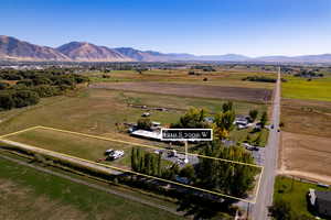 Aerial view with a rural view and a mountain view