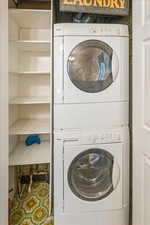 Laundry area with stacked washer / dryer