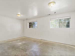 Downstairs living room with plenty of natural light