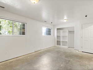 Downstairs living room with built in shelving.