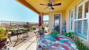 View of patio featuring ceiling fan