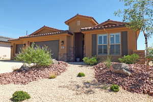 View of front of property featuring a garage