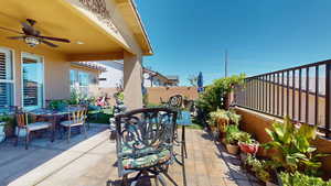 View of patio with ceiling fan