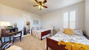 Bedroom with light carpet and ceiling fan