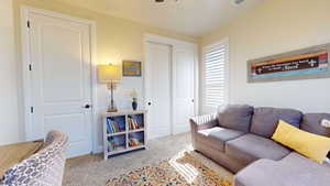 Living room with light colored carpet