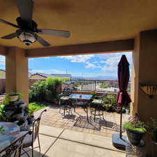 View of patio featuring ceiling fan