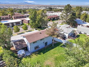 Birds eye view of property with a mountain view