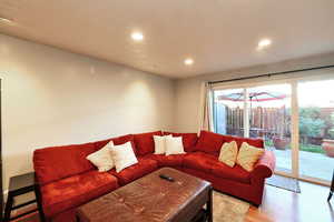 Living room with hardwood / wood-style floors