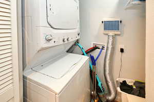 Laundry room with stacked washer / drying machine