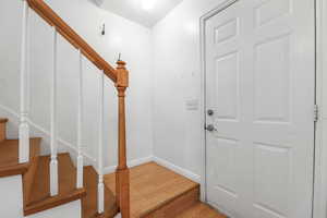 Entryway with wood-type flooring