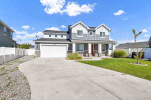 View of front of property featuring a front lawn, a porch, and additional parking