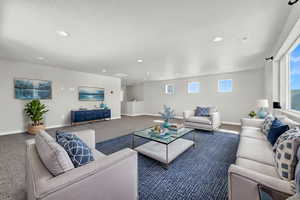 View of carpeted living room. Virtually Staged