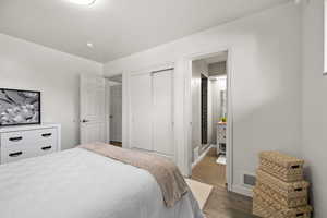 Bedroom featuring hardwood / wood-style flooring and a closet