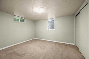 Basement featuring carpet floors