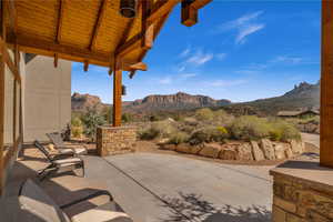 View of patio / terrace with a mountain view