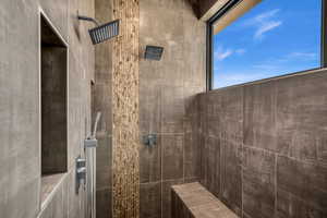 Bathroom with tiled shower