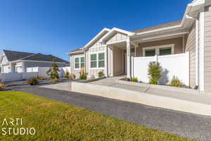 Front entry ramp, front patio and pathway (goes all the way around home)