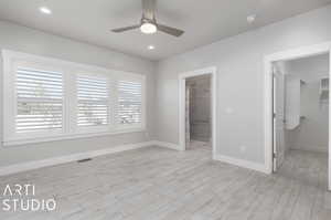 Master bedroom lookin into master bath and walk in closet