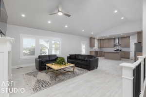 View of great room from entry leading to kitchen and island