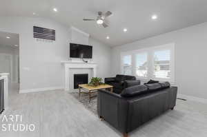 Great room featuring fireplace and mantle