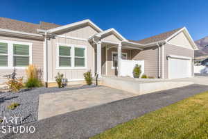 Front entry showing front patio. Well shaded in evening.