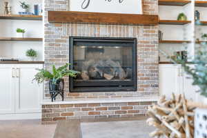 Exposed brick fireplace