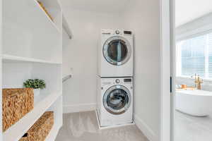 Laundry hookup in primary bedroom's walk-in closet