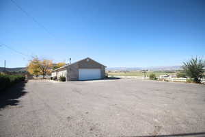 Garage featuring a mountain view