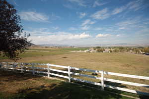 View of yard featuring a mountain view and a rural view