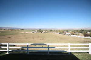 View of yard with a mountain view and a rural view