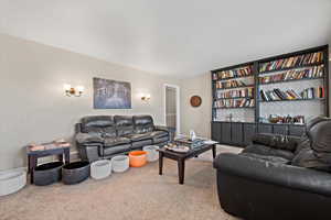 Living room with carpet floors