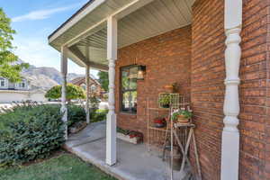 View of patio featuring a mountain view and covered porch