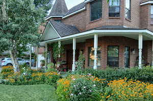 View of home's exterior featuring a porch